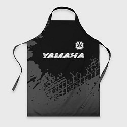 Фартук Yamaha speed на темном фоне со следами шин: символ