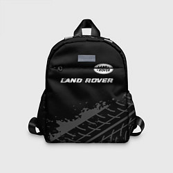 Детский рюкзак Land Rover speed на темном фоне со следами шин: си